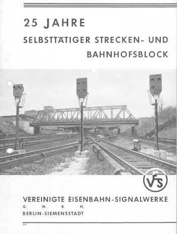 Titel, Foto Gleise mit Stromschiene, 3 Sv-Signale, hinten Brücke über die Gleise und Stw Westkreuz, VES-Symbol